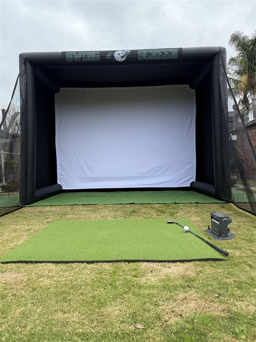 Front view of the Swing Screen simulator with hitting mat, club and launch monitor